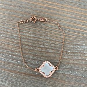 Adjustable rose gold & cream colored stone